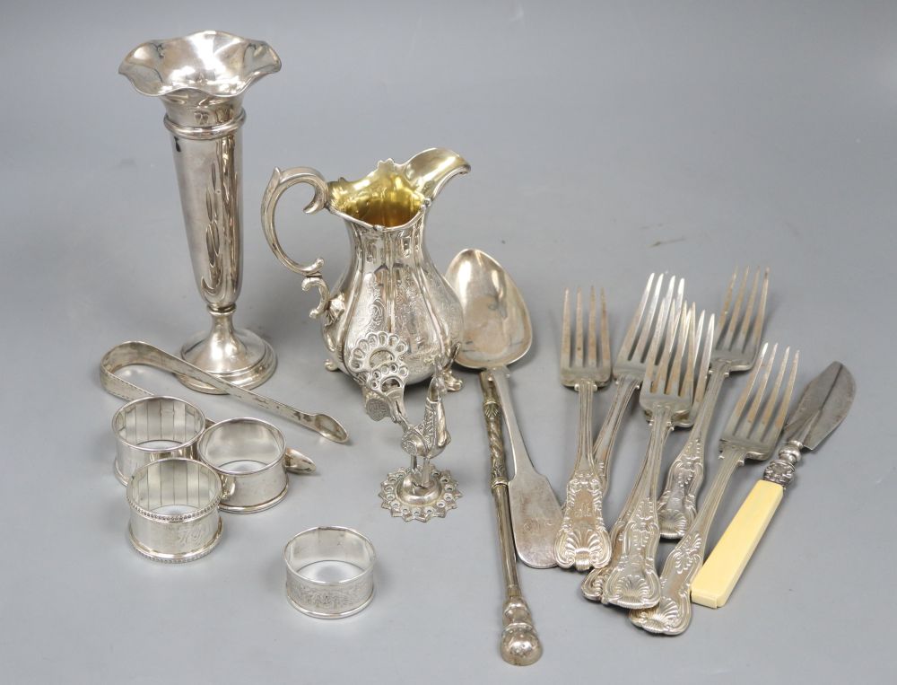 Assorted silver including a Victorian silver cream jug, silver posy vase, four silver napkin rings etc.